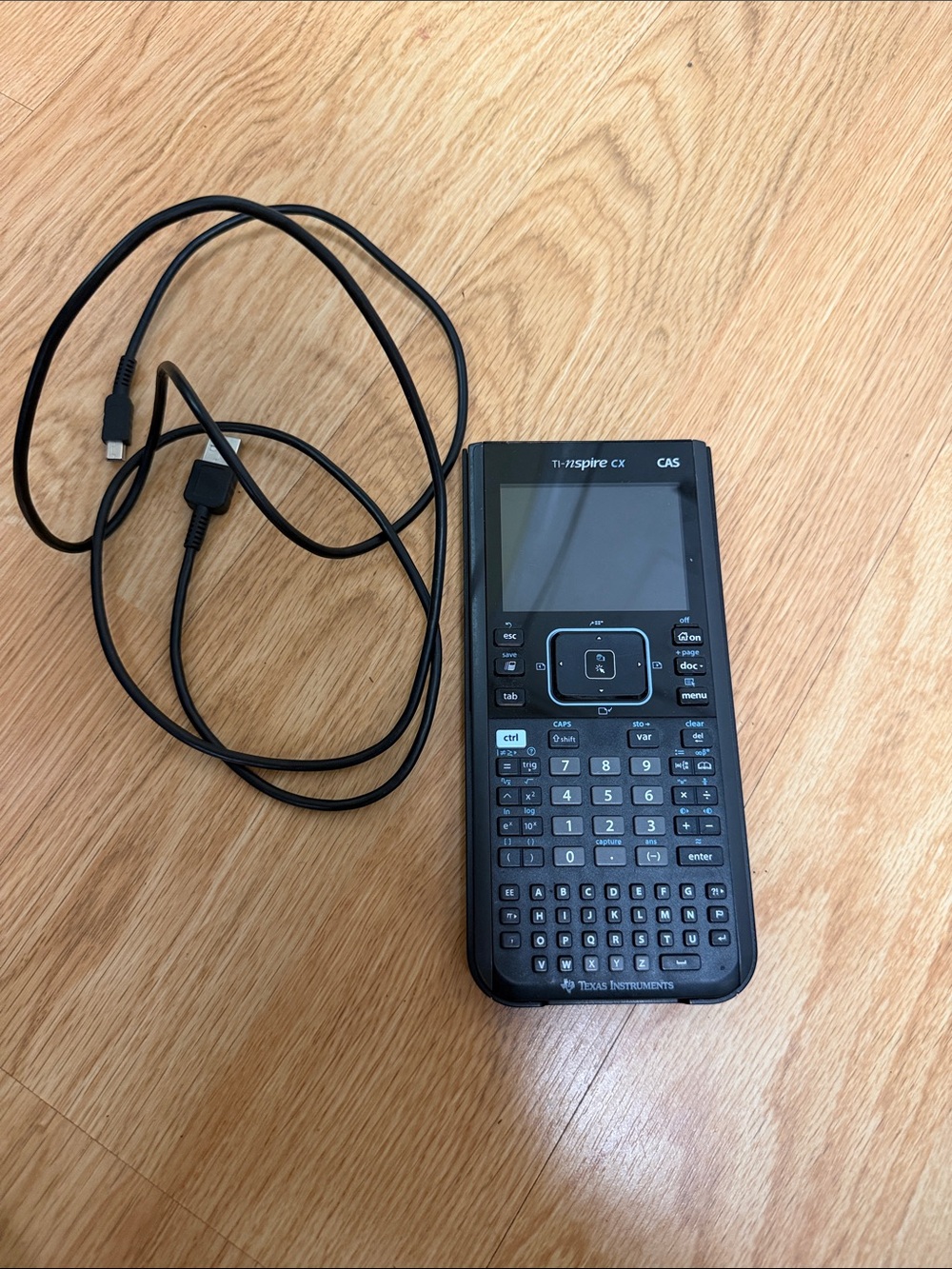 Texas Instruments TI-Nspire CX CAS graphing calculator.